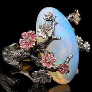 PLUM BRANCH & OPAL RING